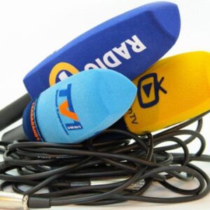 Colored foam microphone windshields (blue and yellow) stacked together