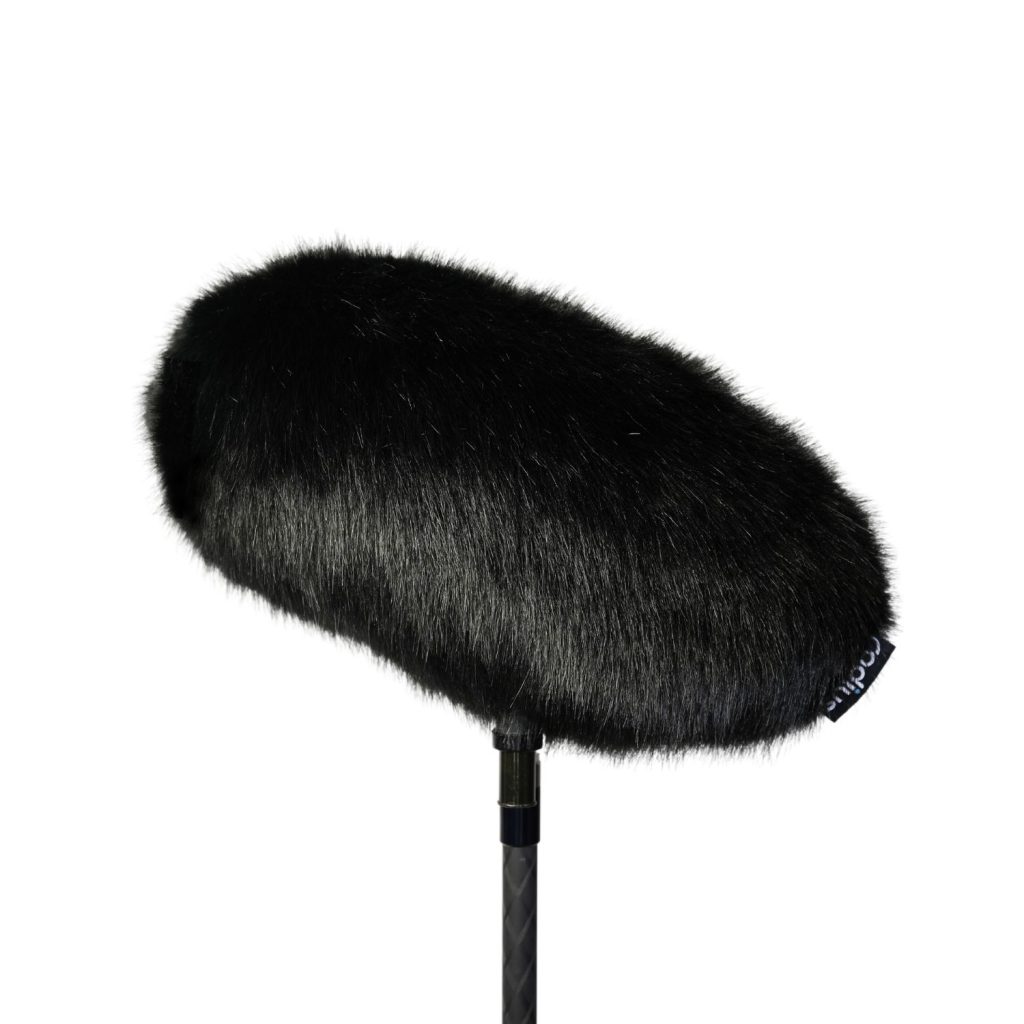 Close-up view of multi-pile synthetic acoustic fur construction