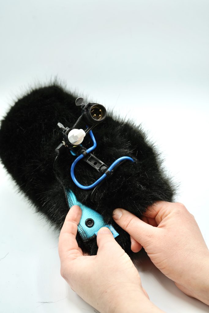 Interior view of Cinela COSI windshield system showing internal microphone mounting structure