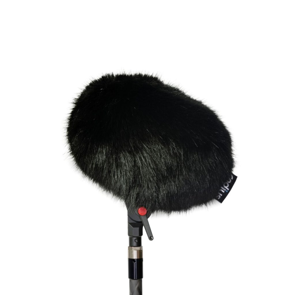 Professional replacement windcover showing multi-pile synthetic fur construction and internal lining