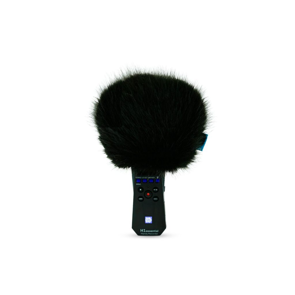 Black synthetic fur windcover fitted on Zoom H1essential recorder showing elastic grip attachment