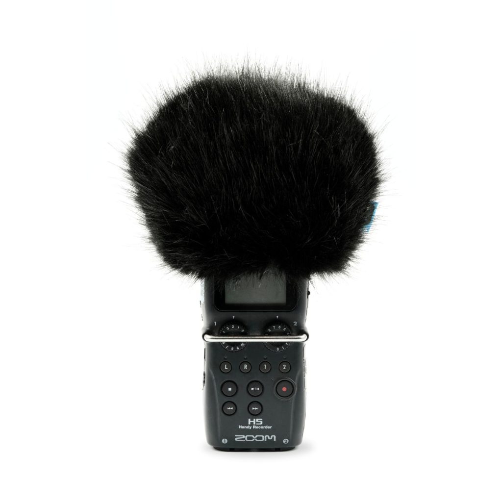 Black synthetic fur windcover showing elastic base and foam construction